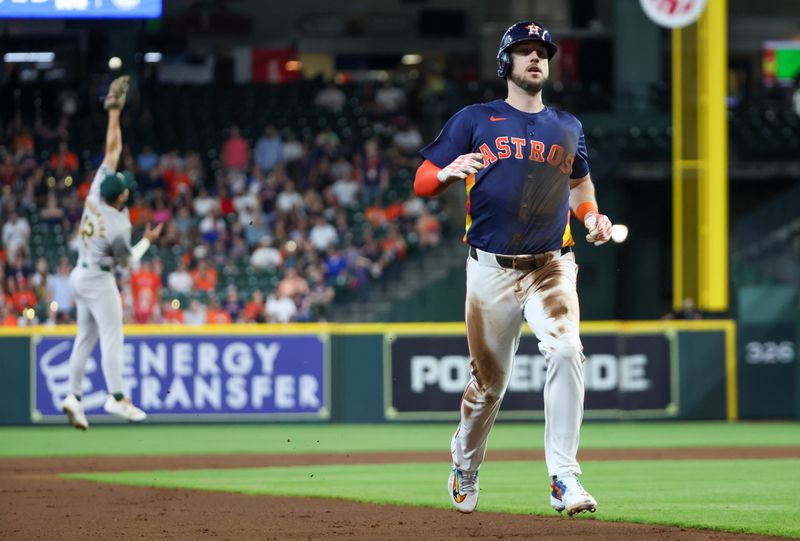 May 15, 2024; Houston, Texas, USA; Houston Astros right fielder Kyle Tucker (30) tags up to third base against the Oakland Athletics in the first inning at Minute Maid Park. Mandatory Credit: Thomas Shea-USA TODAY Sports