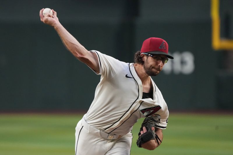 May 6, 2025; Phoenix, Arizona, USA; Arizona Diamondbacks pitcher Zac Gallen (23) throws against the New York Mets in the first inning at Chase Field. Mandatory Credit: Rick Scuteri-Imagn Images