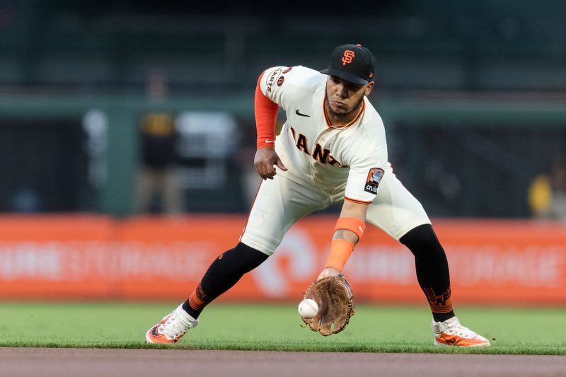 Sep 27, 2023; San Francisco, California, USA; San Francisco Giants second baseman Thairo Estrada (39) fields a ground ball for an out against the San Diego Padres during the first inning at Oracle Park. Mandatory Credit: John Hefti-USA TODAY Sports