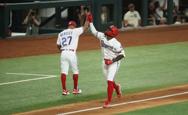 Jun 28, 2023; Arlington, Texas, USA;  Texas Rangers right fielder Adolis Garcia (53) celebrates after hitting a two-run home run during the sixth inning against the Detroit Tigers at Globe Life Field. Mandatory Credit: Kevin Jairaj-USA TODAY Sports