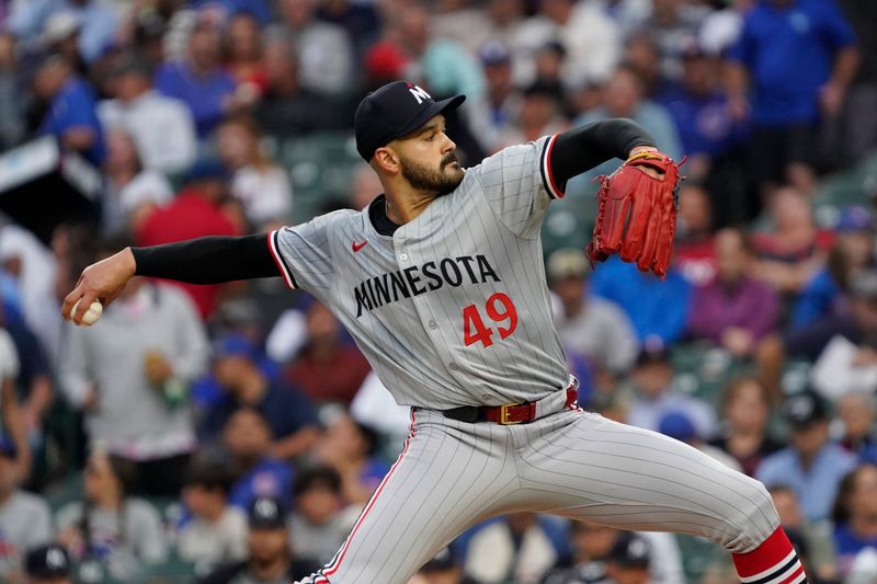 Aug 6, 2024; Chicago, Illinois, USA; Minnesota Twins pitcher Pablo López (49) throws the ball against the Chicago Cubs during the first inning at Wrigley Field. Mandatory Credit: David Banks-USA TODAY Sports