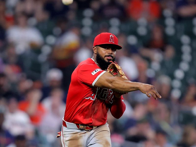 May 20, 2024; Houston, Texas, USA; Los Angeles Angels second base Luis Rengifo (2) throws a fielded ball to first base for an out against the Houston Astros during the second inning at Minute Maid Park. Mandatory Credit: Erik Williams-USA TODAY Sports