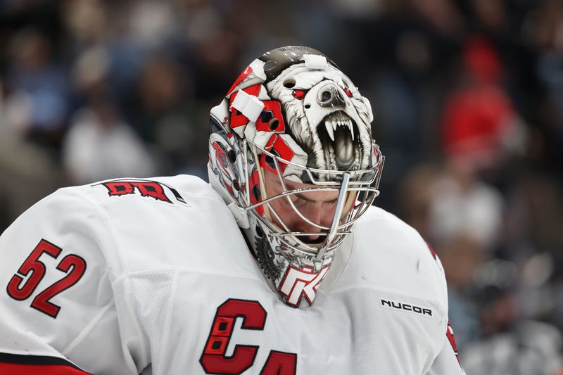 Nov 13, 2024; Salt Lake City, Utah, USA; A view of the helmet worn by Carolina Hurricanes goaltender Pyotr Kochetkov (52) against the Utah Hockey Club during the second period at Delta Center. Mandatory Credit: Rob Gray-Imagn Images