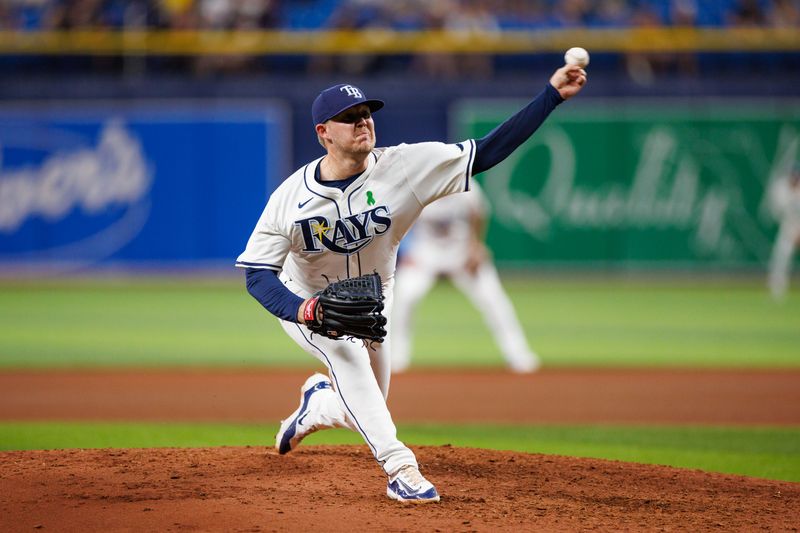 May 21, 2024; St. Petersburg, Florida, USA;  Tampa Bay Rays pitcher Garrett Cleavinger (60) throws a pitch against the Boston Red Sox in the seventh inning at Tropicana Field. Mandatory Credit: Nathan Ray Seebeck-USA TODAY Sports