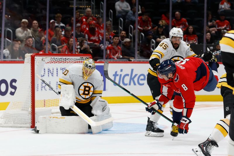 Oct 2, 2025; Washington, District of Columbia, USA; Washington Capitals left wing Alex Ovechkin (8) shoots the puck on Boston Bruins goaltender Joonas Korpisalo (70) in the first period at Capital One Arena. Mandatory Credit: Geoff Burke-Imagn Images