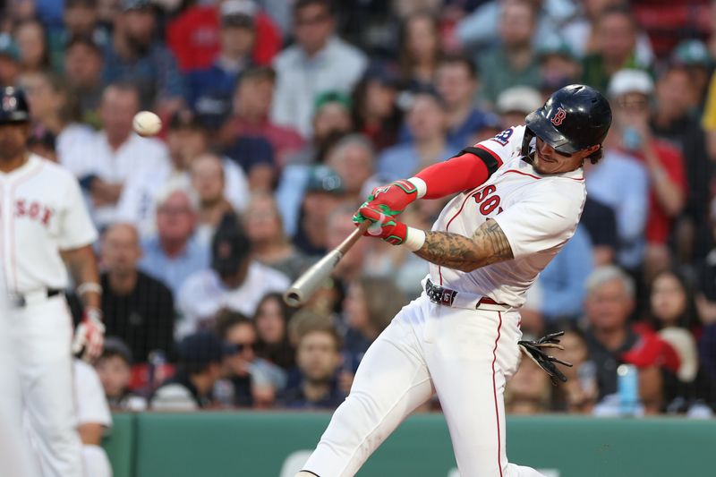Jun 3, 2025; Boston, Massachusetts, USA; Boston Red Sox left fielder Jarren Duran (16) hits an RBI double during the third inning against the Los Angeles Angels at Fenway Park. Mandatory Credit: Paul Rutherford-Imagn Images