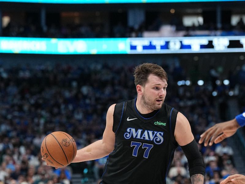 DALLAS, TX - MARCH 3: Luka Doncic #77 of the Dallas Mavericks dribbles the ball during the game against the Philadelphia 76ers on March 3, 2024 at the American Airlines Center in Dallas, Texas. NOTE TO USER: User expressly acknowledges and agrees that, by downloading and or using this photograph, User is consenting to the terms and conditions of the Getty Images License Agreement. Mandatory Copyright Notice: Copyright 2024 NBAE (Photo by Glenn James/NBAE via Getty Images)