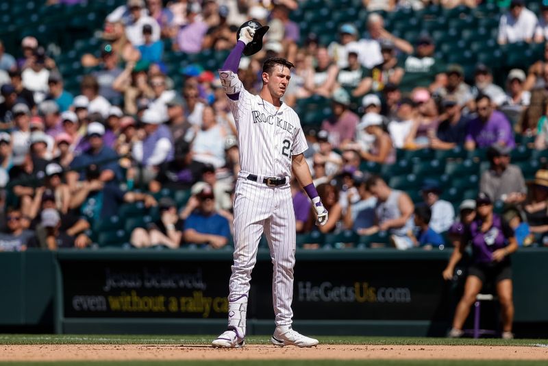 Aug 20, 2023; Denver, Colorado, USA; Colorado Rockies left fielder Nolan Jones (22) reacts after being tagged out in the seventh inning against the Chicago White Sox at Coors Field. Mandatory Credit: Isaiah J. Downing-USA TODAY Sports