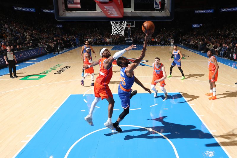 OKLAHOMA CITY, OK - JANUARY 3:  Mikal Bridges #25 of the New York Knicks drives to the basket during the game against the Oklahoma City Thunder on January 3, 2025 at Paycom Center in Oklahoma City, Oklahoma. NOTE TO USER: User expressly acknowledges and agrees that, by downloading and or using this photograph, User is consenting to the terms and conditions of the Getty Images License Agreement. Mandatory Copyright Notice: Copyright 2025 NBAE (Photo by Zach Beeker/NBAE via Getty Images)