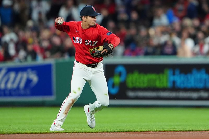 May 10, 2024; Boston, Massachusetts, USA; Boston Red Sox second baseman Vaughn Grissom (5) throws out Washington Nationals left fielder Eddie Rosario (not pictured) after fielding a ground ball during the sixth inning at Fenway Park. Mandatory Credit: Gregory Fisher-USA TODAY Sports