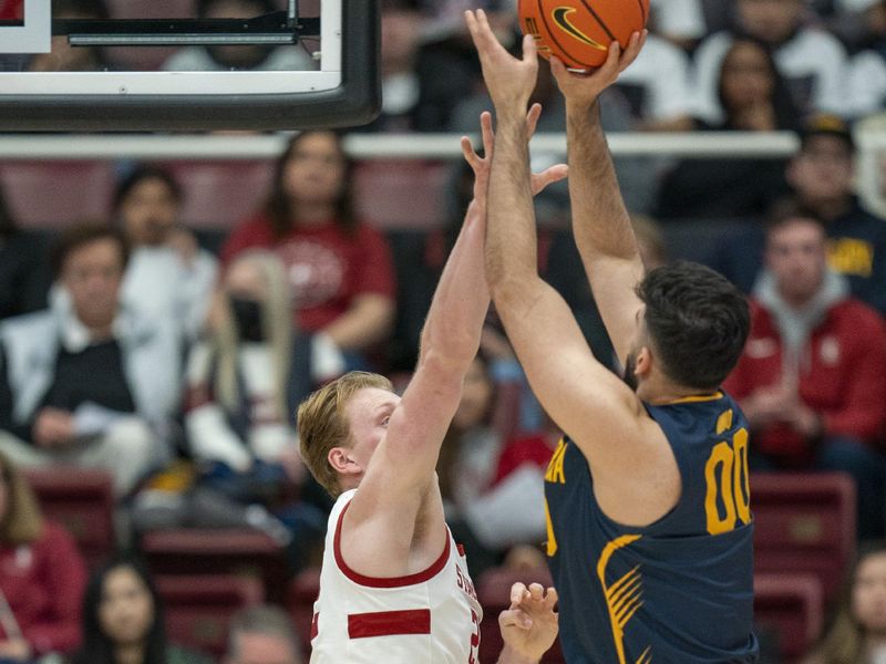 Mar 7, 2024; Stanford, California, USA; California Golden Bears forward Fardaws Aimaq (00) shoots the basketball over Stanford Cardinal forward James Keefe (22) during the first half at Maples Pavillion. Mandatory Credit: Neville E. Guard-USA TODAY Sports