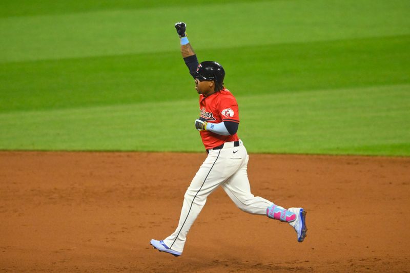 Aug 24, 2024; Cleveland, Ohio, USA; Cleveland Guardians third baseman Jose Ramirez (11) celebrates his solo home run in the sixth inning against the Texas Rangers at Progressive Field. Mandatory Credit: David Richard-USA TODAY Sports