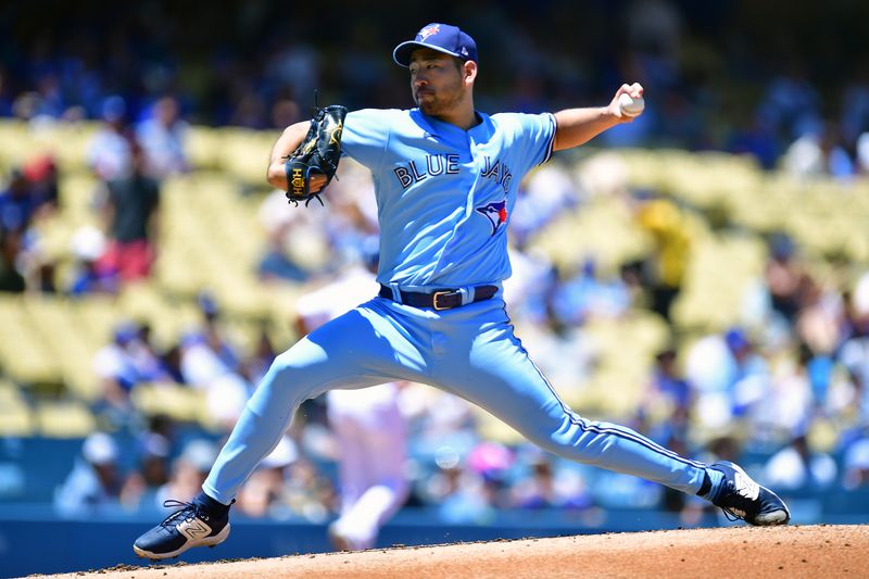 Jul 26, 2023; Los Angeles, California, USA; Toronto Blue Jays starting pitcher Yusei Kikuchi (16) throws against the Los Angeles Dodgers during the first inning at Dodger Stadium. Mandatory Credit: Gary A. Vasquez-USA TODAY Sports