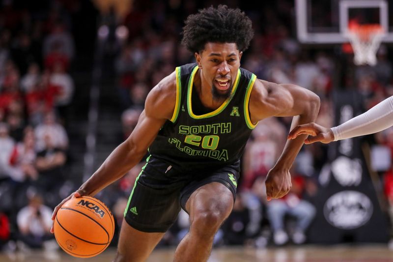 Feb 11, 2023; Cincinnati, Ohio, USA; South Florida Bulls forward Sam Hines Jr. (20) dribbles against the Cincinnati Bearcats in the second half at Fifth Third Arena. Mandatory Credit: Katie Stratman-USA TODAY Sports