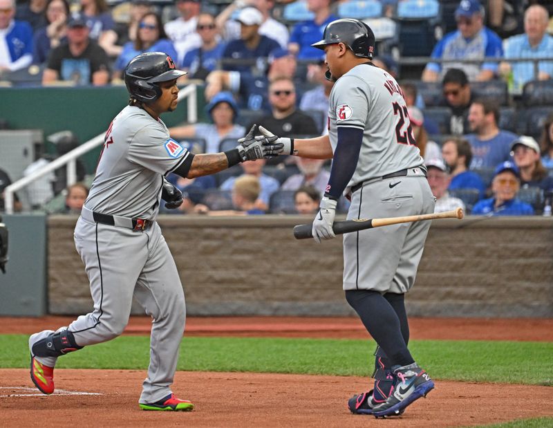 Jun 28, 2024; Kansas City, Missouri, USA;  Cleveland Guardians third baseman Jose Ramirez (left) celebrates with first baseman Josh Naylor (right) after hitting a solo home run in the first inning against the Kansas City Royals at Kauffman Stadium. Mandatory Credit: Peter Aiken-USA TODAY Sports