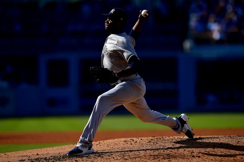 Jun 4, 2023; Los Angeles, California, USA; New York Yankees starting pitcher Domingo German (0) throws against the Los Angeles Dodgers during the fourth inning at Dodger Stadium. Mandatory Credit: Gary A. Vasquez-USA TODAY Sports