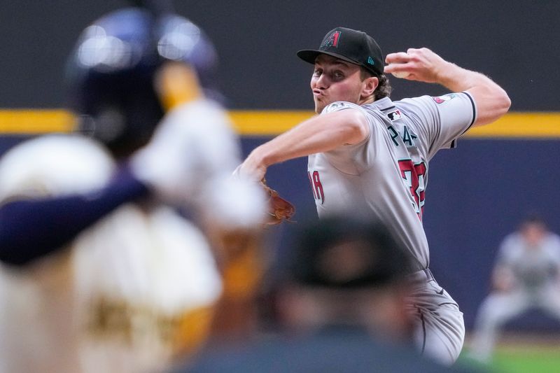 Sep 19, 2024; Milwaukee, Wisconsin, USA;  Arizona Diamondbacks pitcher Brandon Pfaadt (32) throws a pitch during the first inning against the Milwaukee Brewers at American Family Field. Mandatory Credit: Jeff Hanisch-Imagn Images