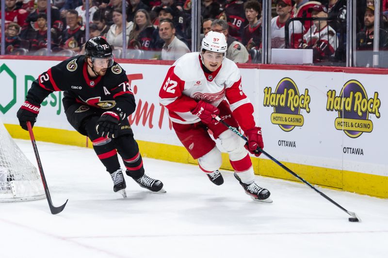 Mar 10, 2025; Ottawa, Ontario, CAN; Ottawa Senators defenseman Thomas Chabot (72) chases Detroit Red Wings center Marco Kasper (92) who controls the puck in the second period at the Canadian Tire Centre. Mandatory Credit: Marc DesRosiers-Imagn Images