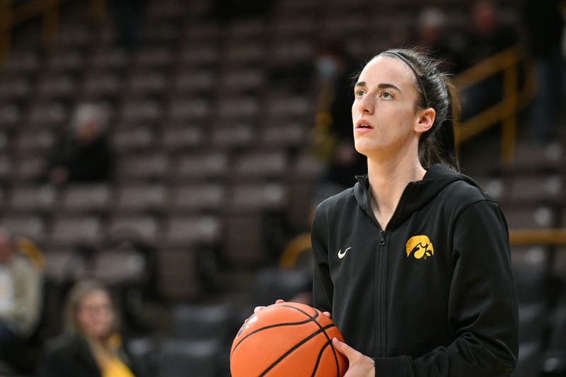 Feb 15, 2024; Iowa City, Iowa, USA; Iowa Hawkeyes guard Caitlin Clark (22) warms up before the game against the Michigan Wolverines at Carver-Hawkeye Arena. Mandatory Credit: Jeffrey Becker-USA TODAY Sports