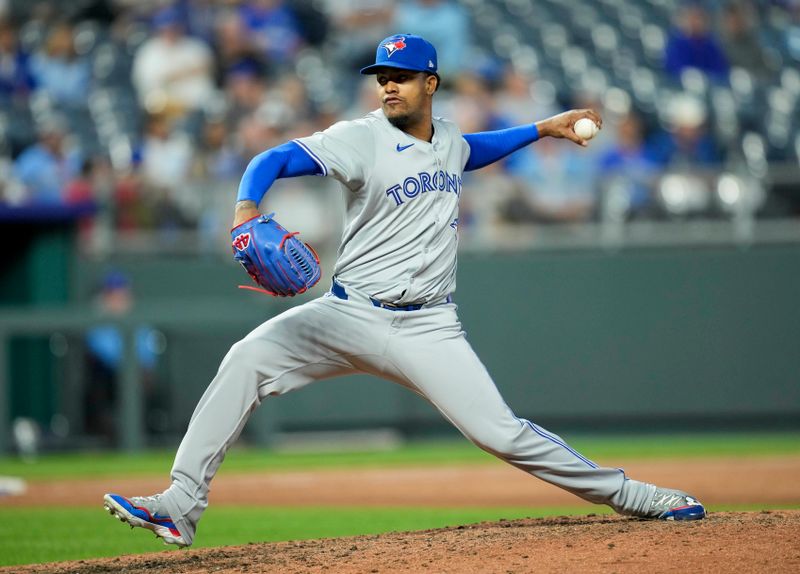 Apr 24, 2024; Kansas City, Missouri, USA; Toronto Blue Jays pitcher Genesis Cabrera (92) pitches during the fifth inning against the Kansas City Royals at Kauffman Stadium. Mandatory Credit: Jay Biggerstaff-USA TODAY Sports