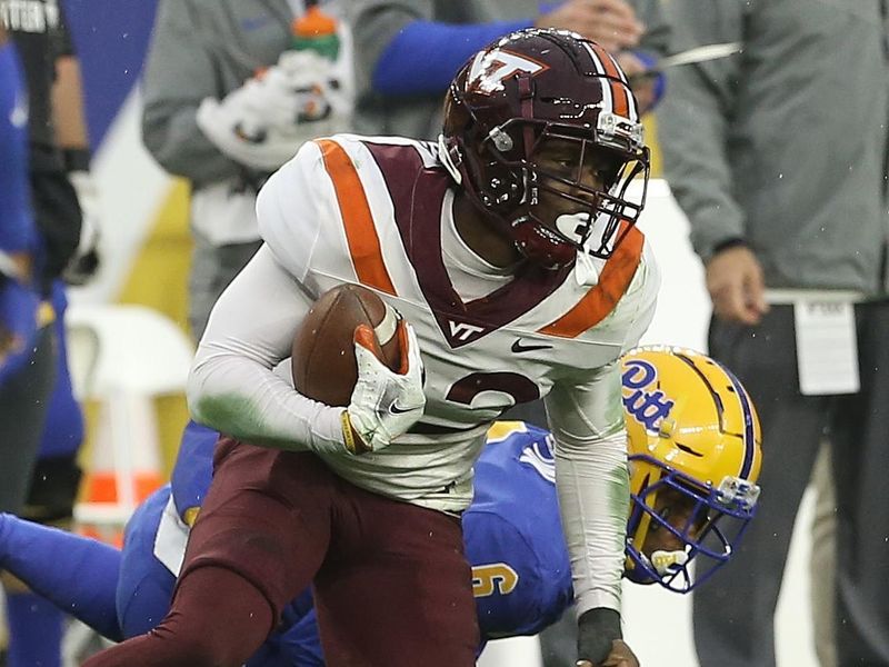 Nov 21, 2020; Pittsburgh, Pennsylvania, USA;  Virginia Tech Hokies defensive back Chamarri Conner (22) intercepts a pass intended for Pittsburgh Panthers wide receiver Tre Tipton (6) during the first quarter at Heinz Field. Mandatory Credit: Charles LeClaire-USA TODAY Sports