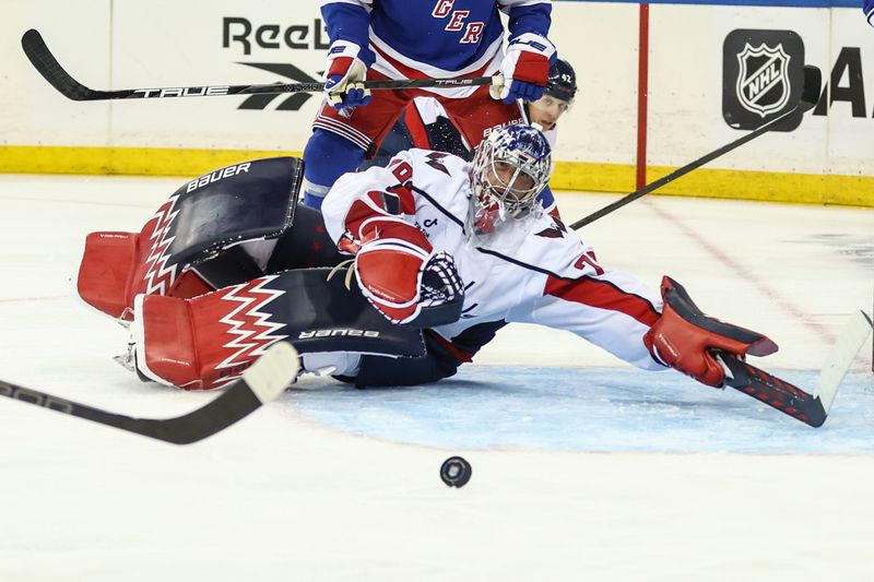 Oct 12, 2025; New York, New York, USA;  Washington Capitals goaltender Charlie Lindgren (79) defends the net in the second period against the New York Rangers at Madison Square Garden. Mandatory Credit: Wendell Cruz-Imagn Images