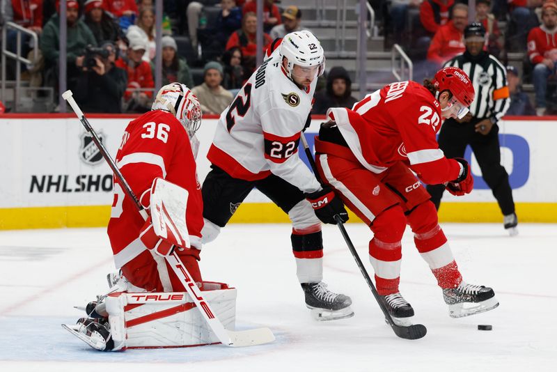 Jan 18, 2026; Detroit, Michigan, USA; Ottawa Senators right wing Michael Amadio (22) and Detroit Red Wings defenseman Albert Johansson (20) battle for the puck in front of goaltender John Gibson (36) in the first period at Little Caesars Arena. Mandatory Credit: Rick Osentoski-Imagn Images
