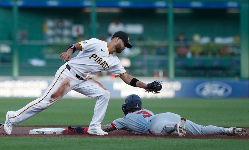 Sep 5, 2024; Pittsburgh, Pennsylvania, USA;  Washington Nationals right fielder Dylan Crews (3) steals second base ahead of a tag attempt by Pittsburgh Pirates shortstop Isiah Kiner-Falefa (7) during the first inning at PNC Park. Mandatory Credit: Charles LeClaire-Imagn Images