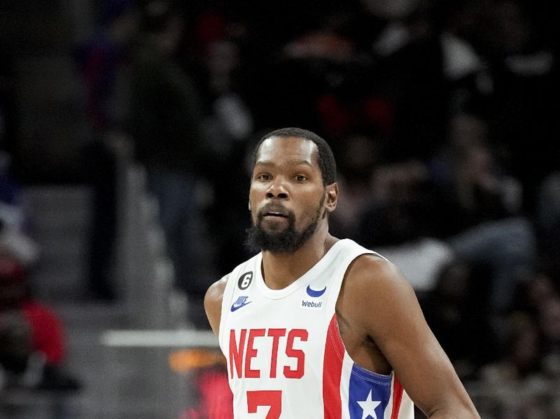 DETROIT, MICHIGAN - DECEMBER 18: Kevin Durant #7 of the Brooklyn Nets handles the ball against the Detroit Pistons at Little Caesars Arena on December 18, 2022 in Detroit, Michigan. NOTE TO USER: User expressly acknowledges and agrees that, by downloading and or using this photograph, User is consenting to the terms and conditions of the Getty Images License Agreement. (Photo by Nic Antaya/Getty Images)