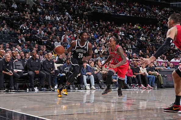 BROOKLYN, NY - NOVEMBER 26: Dorian Finney-Smith #28 of the Brooklyn Nets drives to the basket during the game against the Chicago Bulls on November 26, 2023 at Barclays Center in Brooklyn, New York. NOTE TO USER: User expressly acknowledges and agrees that, by downloading and or using this Photograph, user is consenting to the terms and conditions of the Getty Images License Agreement. Mandatory Copyright Notice: Copyright 2023 NBAE (Photo by Jesse D. Garrabrant/NBAE via Getty Images)