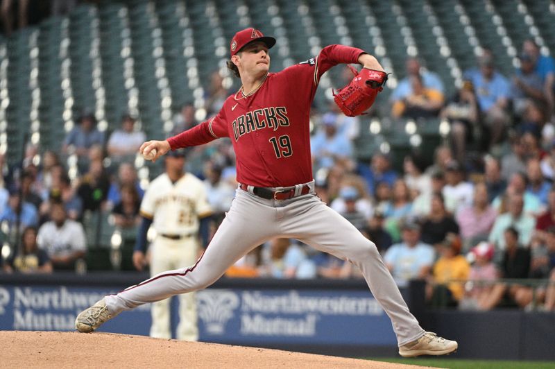 Jun 20, 2023; Milwaukee, Wisconsin, USA; Arizona Diamondbacks starting pitcher Ryne Nelson (19) delivers a pitch against the Milwaukee Brewers in the first inning at American Family Field. Mandatory Credit: Michael McLoone-USA TODAY Sports