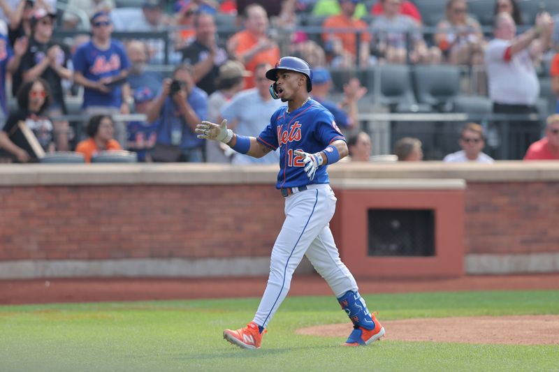 Jul 1, 2023; New York City, New York, USA; New York Mets shortstop Francisco Lindor (12) reacts after hitting a solo home run against the San Francisco Giants during the third inning at Citi Field. Mandatory Credit: Brad Penner-USA TODAY Sports