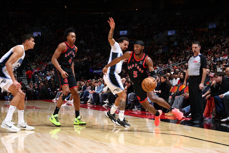 TORONTO, CANADA - JANUARY 3: Immanuel Quickley #5 of the Toronto Raptors drives to the basket during the game against the Orlando Magic on January 3, 2025 at the Scotiabank Arena in Toronto, Ontario, Canada.  NOTE TO USER: User expressly acknowledges and agrees that, by downloading and or using this Photograph, user is consenting to the terms and conditions of the Getty Images License Agreement.  Mandatory Copyright Notice: Copyright 2025 NBAE (Photo by Vaughn Ridley/NBAE via Getty Images)