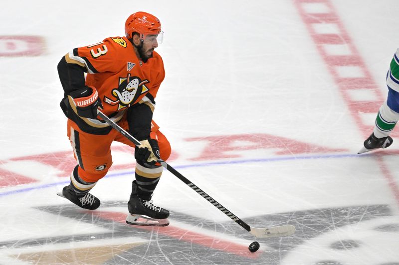 Nov 5, 2024; Anaheim, California, USA; Anaheim Ducks center Robby Fabbri (13) handles the puck in the first period against the Vancouver Canucks at Honda Center. Mandatory Credit: Jayne Kamin-Oncea-Imagn Images