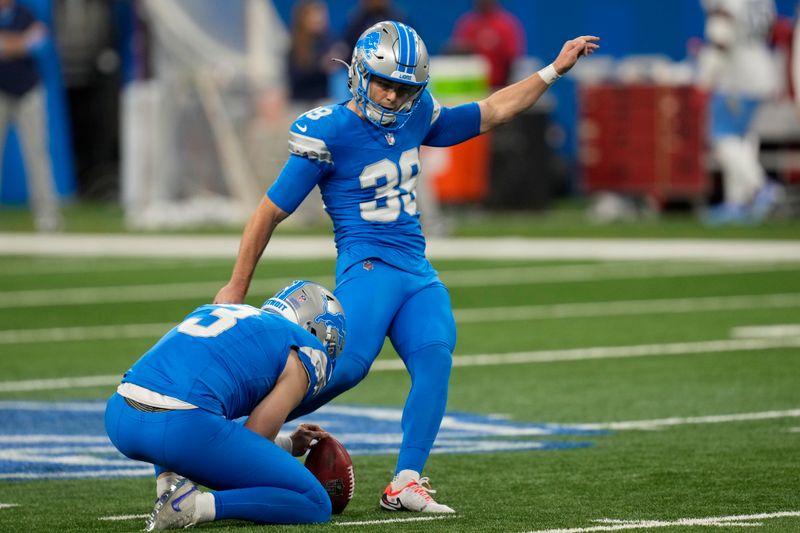 Detroit Lions place-kicker Jake Bates (39) kicks a field goal during the second half of an NFL football game against the Tennessee Titans, Sunday, Oct. 27, 2024, in Detroit. (AP Photo/Paul Sancya)