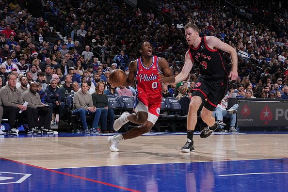 PHILADELPHIA, PA - DECEMBER 22: Tyrese Maxey #0 of the Philadelphia 76ers drives to the basket during the game against the Toronto Raptors on December 22, 2023 at the Wells Fargo Center in Philadelphia, Pennsylvania NOTE TO USER: User expressly acknowledges and agrees that, by downloading and/or using this Photograph, user is consenting to the terms and conditions of the Getty Images License Agreement. Mandatory Copyright Notice: Copyright 2023 NBAE (Photo by Jesse D. Garrabrant/NBAE via Getty Images)