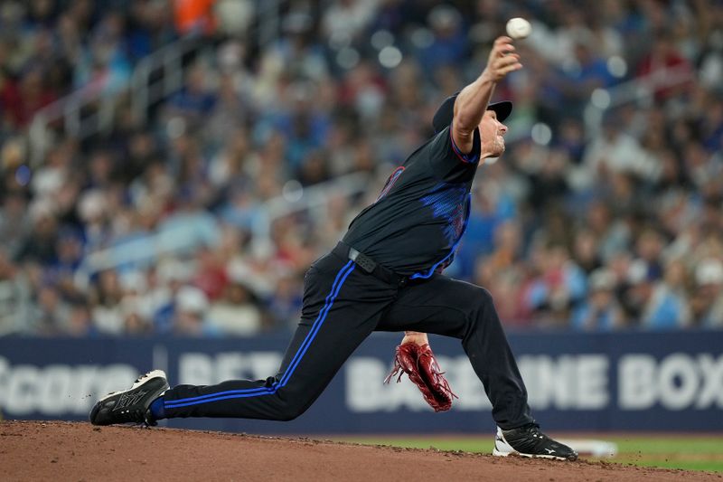 Sep 23, 2024; Toronto, Ontario, CAN; Toronto Blue Jays starting pitcher Chris Bassitt (40) pitches to the Boston Red Sox during the third inning at Rogers Centre. Mandatory Credit: John E. Sokolowski-Imagn Images