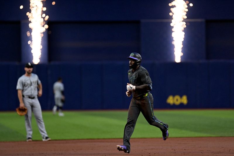 May 7, 2024; St. Petersburg, Florida, USA; Tampa Bay Rays left fielder Randy Arozarena (56) rounds the bases after hitting a two-run home run in the third inning against the Chicago White Sox at Tropicana Field. Mandatory Credit: Jonathan Dyer-USA TODAY Sports