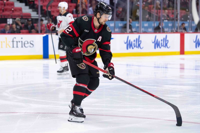 Oct 17, 2024; Ottawa, Ontario, CAN; Ottawa Senators defenseman Thomas Chabot (72) moves the puck in the second period against the New Jersey Devils  at the Canadian Tire Centre. Mandatory Credit: Marc DesRosiers-Imagn Images