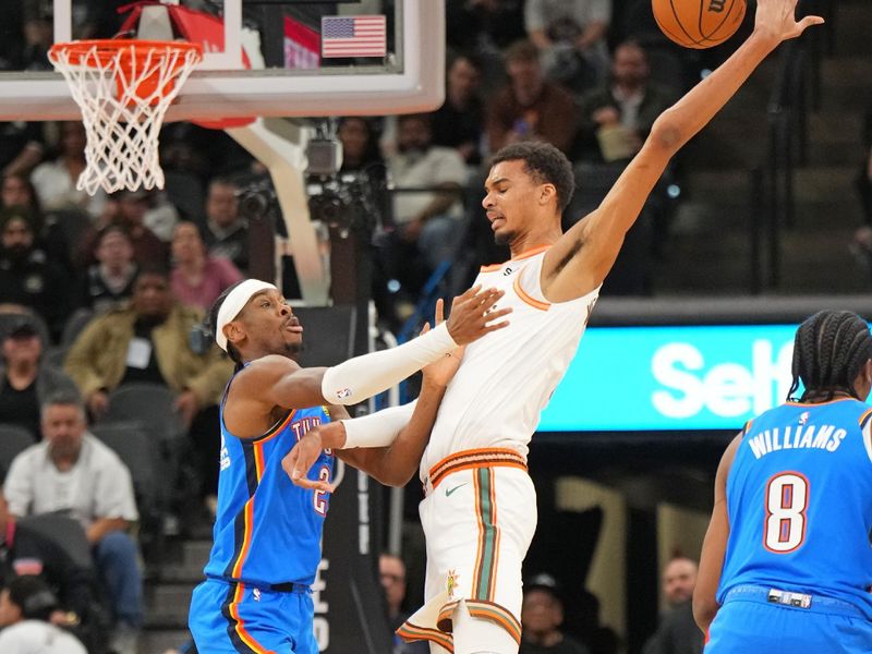 SAN ANTONIO, TX - JANUARY 24: Victor Wembanyama #1 of the San Antonio Spurs blocks the ball during the game against the Oklahoma City Thunder on January 24, 2023 at the Frost Bank Center in San Antonio, Texas. NOTE TO USER: User expressly acknowledges and agrees that, by downloading and or using this photograph, user is consenting to the terms and conditions of the Getty Images License Agreement. Mandatory Copyright Notice: Copyright 2024 NBAE (Photos by Jesse D. Garrabrant/NBAE via Getty Images)