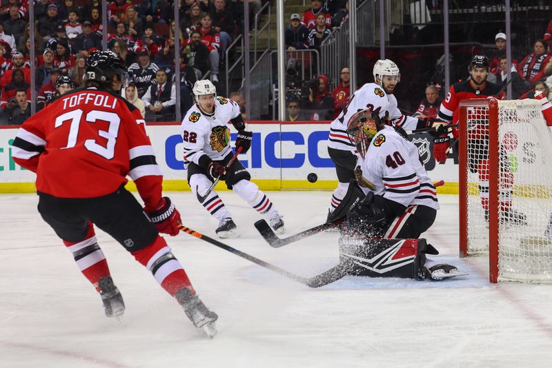 Jan 5, 2024; Newark, New Jersey, USA; Chicago Blackhawks goaltender Arvid Soderblom (40) makes a save against the New Jersey Devils during the second period at Prudential Center. Mandatory Credit: Ed Mulholland-USA TODAY Sports