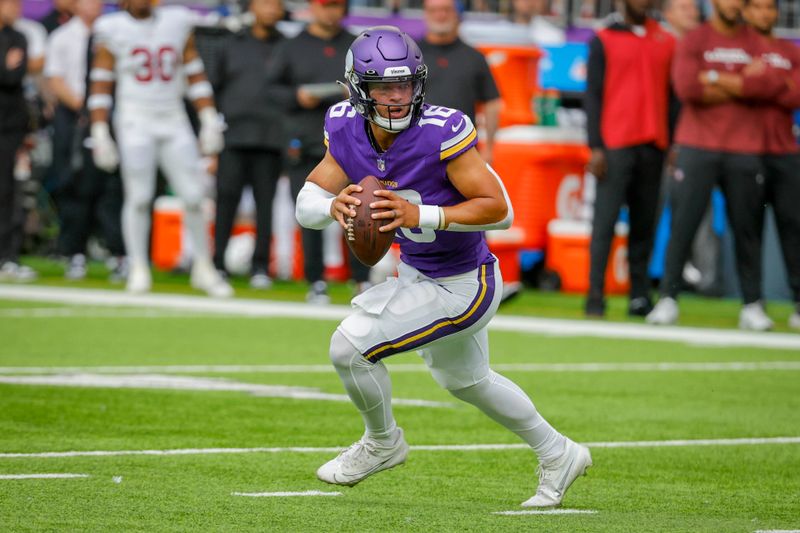 Minnesota Vikings quarterback Jaren Hall (16) scrambles against the Arizona Cardinals during the first half of an NFL preseason football game, Saturday, Aug. 26, 2023, in Minneapolis. (AP Photo/Bruce Kluckhohn)