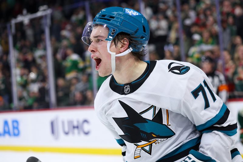 Oct 26, 2025; Saint Paul, Minnesota, USA; San Jose Sharks center Macklin Celebrini (71) celebrates his game winning overtime goal against the Minnesota Wild at Grand Casino Arena. Mandatory Credit: Matt Krohn-Imagn Images