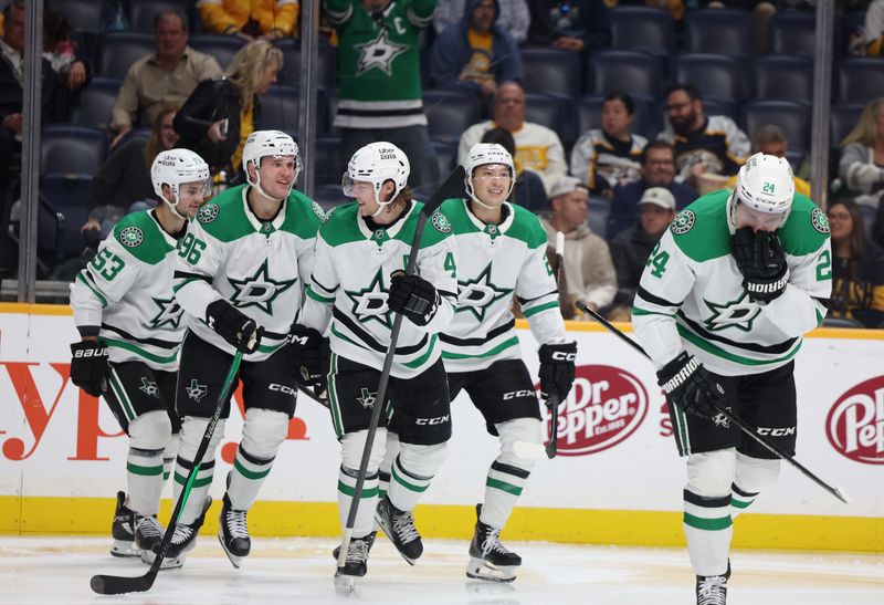 Nov 8, 2025; Nashville, Tennessee, USA; Dallas Stars celebrate a second period goal against the Nashville Predators at Bridgestone Arena. Mandatory Credit: Alan Poizner-Imagn Images