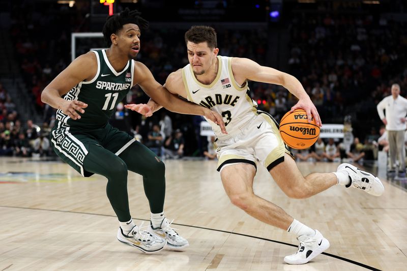 Mar 15, 2024; Minneapolis, MN, USA; Purdue Boilermakers forward Camden Heide (23) works around Michigan State Spartans guard A.J. Hoggard (11) during the first half at Target Center. Mandatory Credit: Matt Krohn-USA TODAY Sports