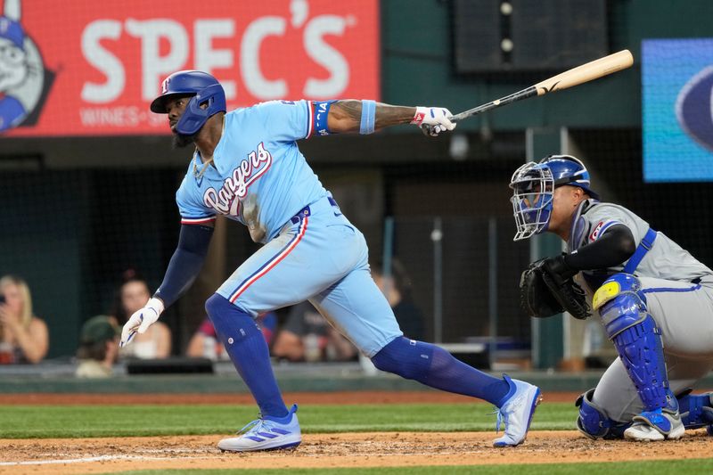 Jun 23, 2024; Arlington, Texas, USA; Texas Rangers right fielder Ardolis Garcia (53) follows through on his single against the Kansas City Royals during the sixth inning at Globe Life Field. Mandatory Credit: Jim Cowsert-USA TODAY Sports