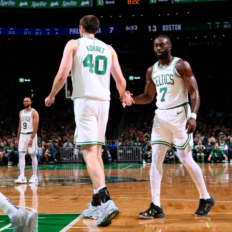 BOSTON, MA - OCTOBER 12: Luke Kornet #40 and Jaylen Brown #7 of the Boston Celtics high five during the game against the Philadelphia 76ers during a NBA Preseason game on October 12, 2024 at TD Garden in Boston, Massachusetts. NOTE TO USER: User expressly acknowledges and agrees that, by downloading and/or using this Photograph, user is consenting to the terms and conditions of the Getty Images License Agreement. Mandatory Copyright Notice: Copyright 2024 NBAE (Photo by Brian Babineau/NBAE via Getty Images)