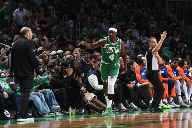 BOSTON, MA - OCTOBER 22: Jrue Holiday #4 of the Boston Celtics celebrates during the game against the New York Knicks on October 22, 2024 at TD Garden in Boston, Massachusetts. NOTE TO USER: User expressly acknowledges and agrees that, by downloading and/or using this Photograph, user is consenting to the terms and conditions of the Getty Images License Agreement. Mandatory Copyright Notice: Copyright 2024 NBAE (Photo by Brian Babineau/NBAE via Getty Images)