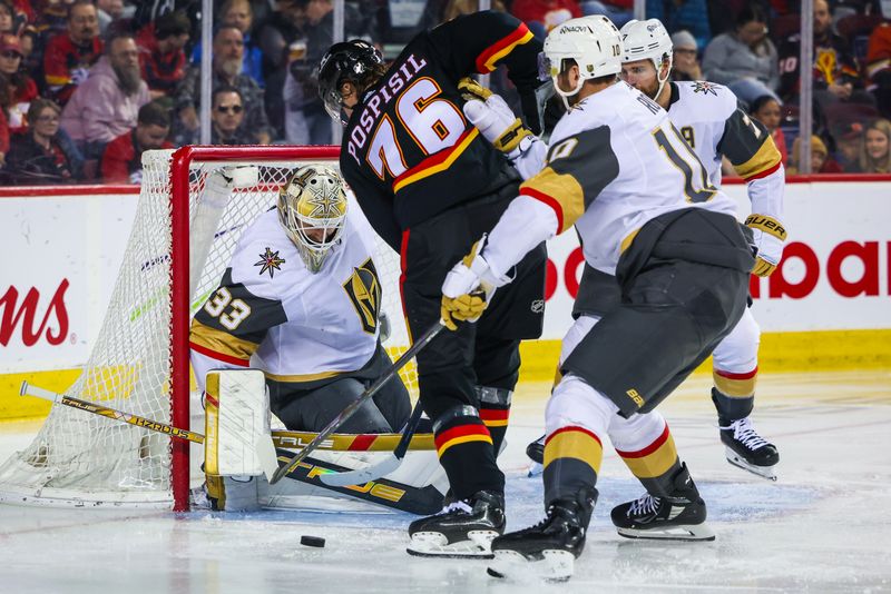 Mar 14, 2024; Calgary, Alberta, CAN; Vegas Golden Knights goaltender Adin Hill (33) makes a save against Calgary Flames center Martin Pospisil (76) during the second period at Scotiabank Saddledome. Mandatory Credit: Sergei Belski-USA TODAY Sports