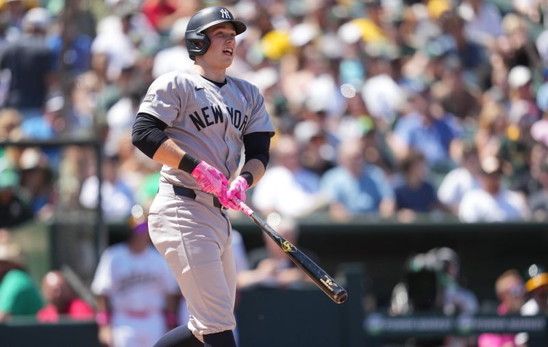 May 11, 2025; West Sacramento, California, USA; New York Yankees designated hitter Ben Rice (22) hits a grand slam against the Athletics in the fifth inning at Sutter Health Park. Mandatory Credit: Cary Edmondson-Imagn Images